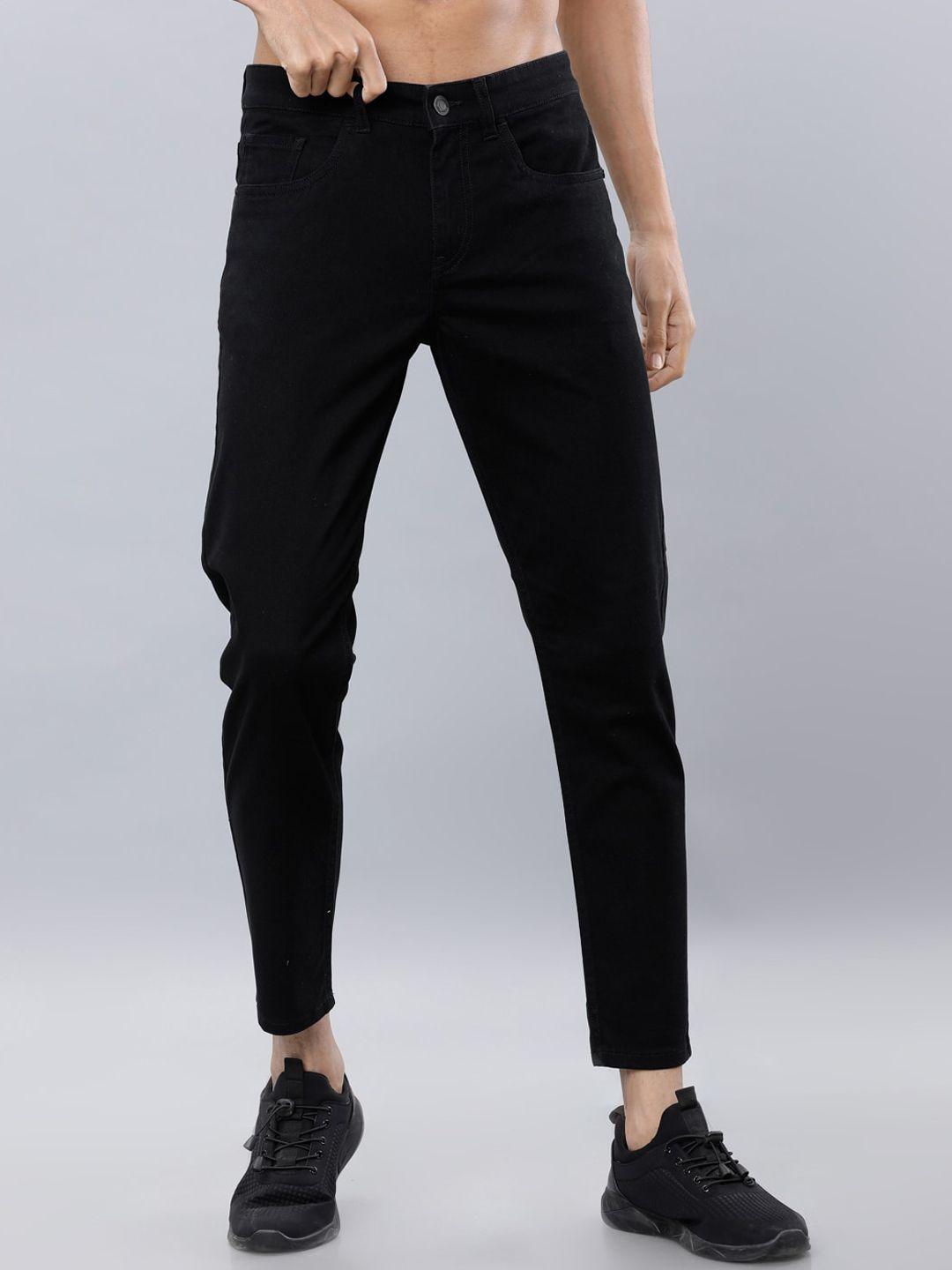 highlander men black tapered fit solid regular trousers