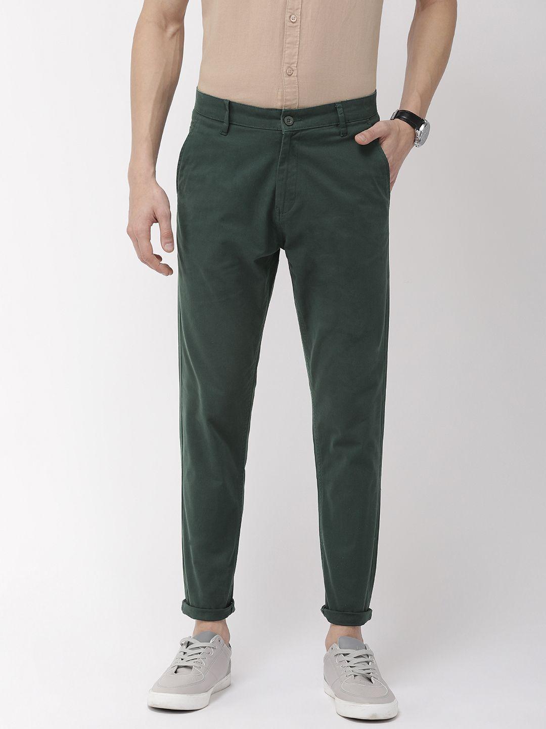 highlander men green tapered fit solid regular trousers