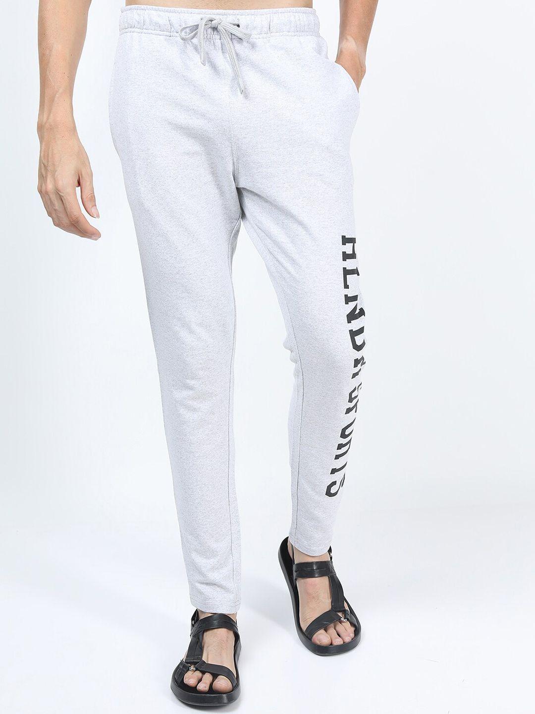 highlander men white & black typogrophy printed slim fit track pants