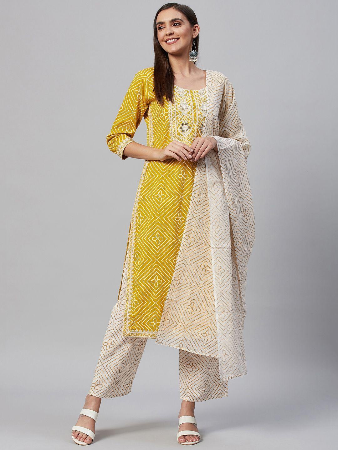 highlight fashion export women mustard yellow printed cotton kurta with trousers & dupatta