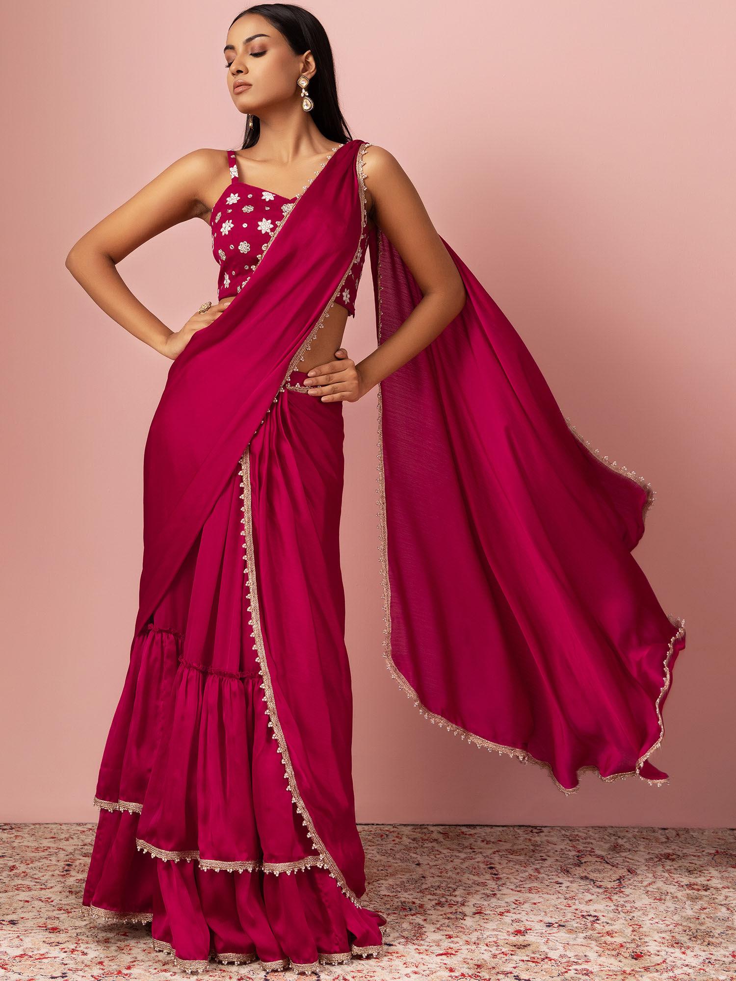 hot pink tiered pre-draped saree with embroidered with stitched blouse