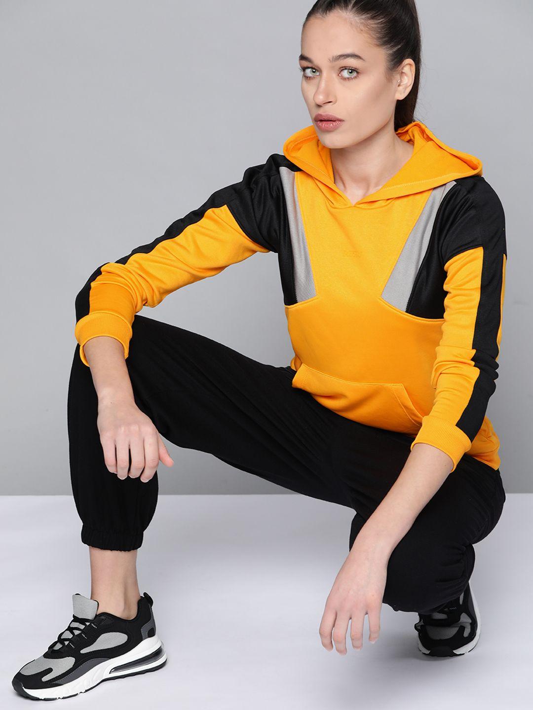 hrx by hrithik roshan women mustard yellow & black colourblocked hooded sweatshirt