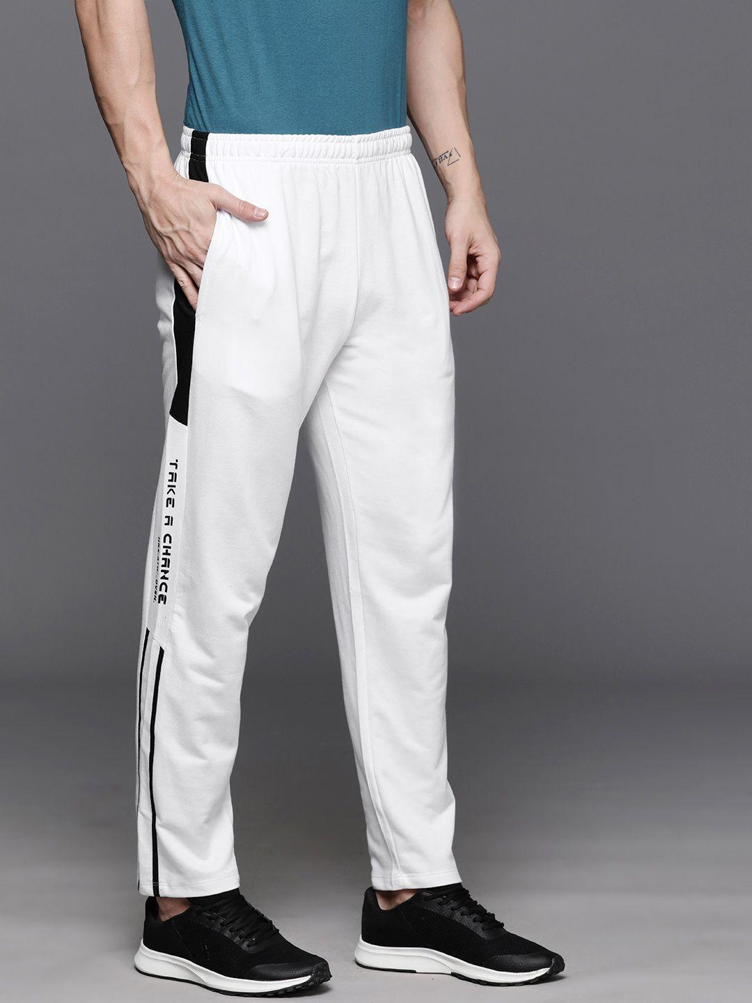 hrx by hrithik roshan men mid-rise typography printed detail track pants