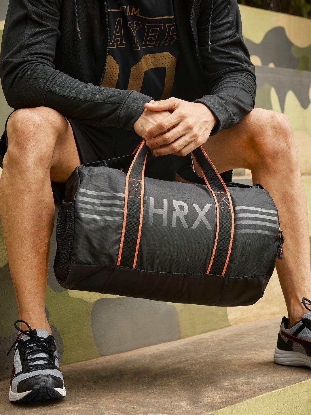 hrx by hrithik roshan unisex black & orange brand logo print training duffel bag 26.2 l
