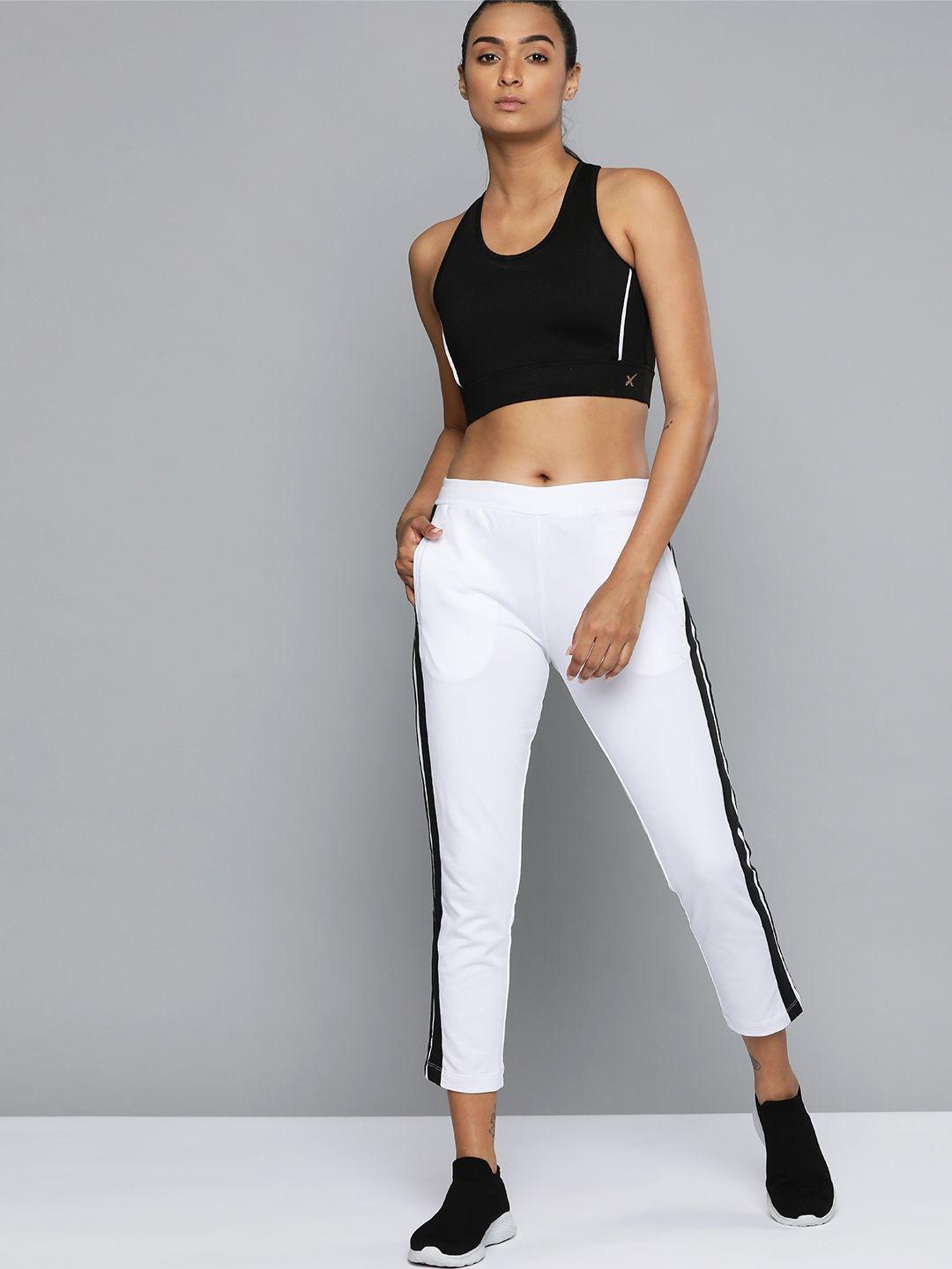 hrx by hrithik roshan women optic white solid slim fit bio-wash lifestyle track pants