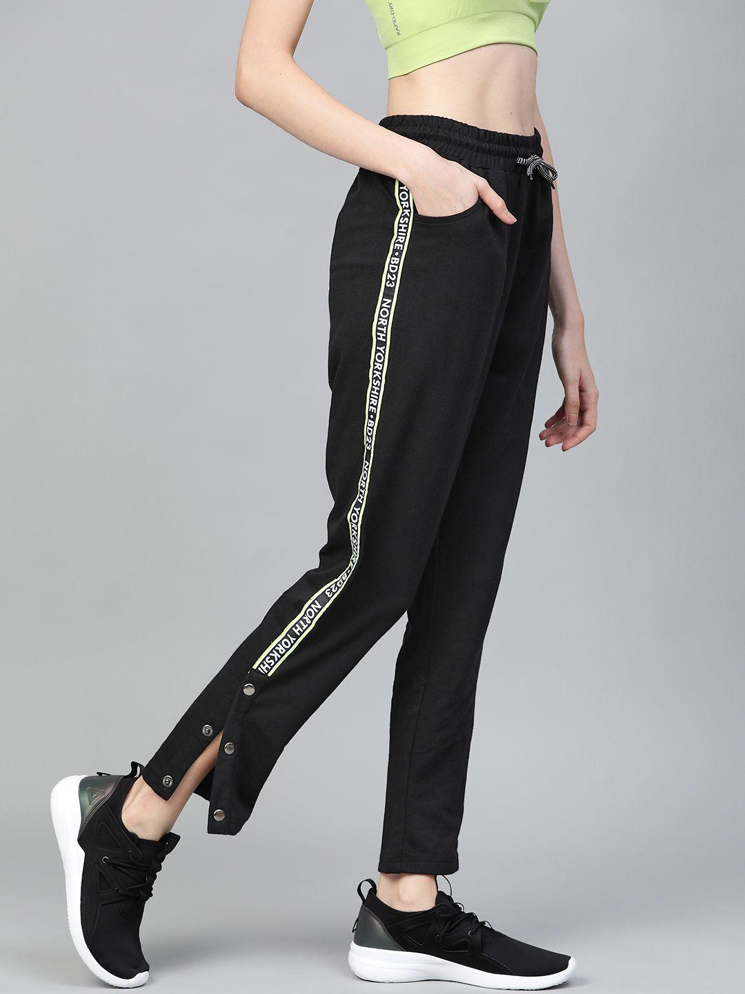 hubberholme women black slim fit solid side taping track pants