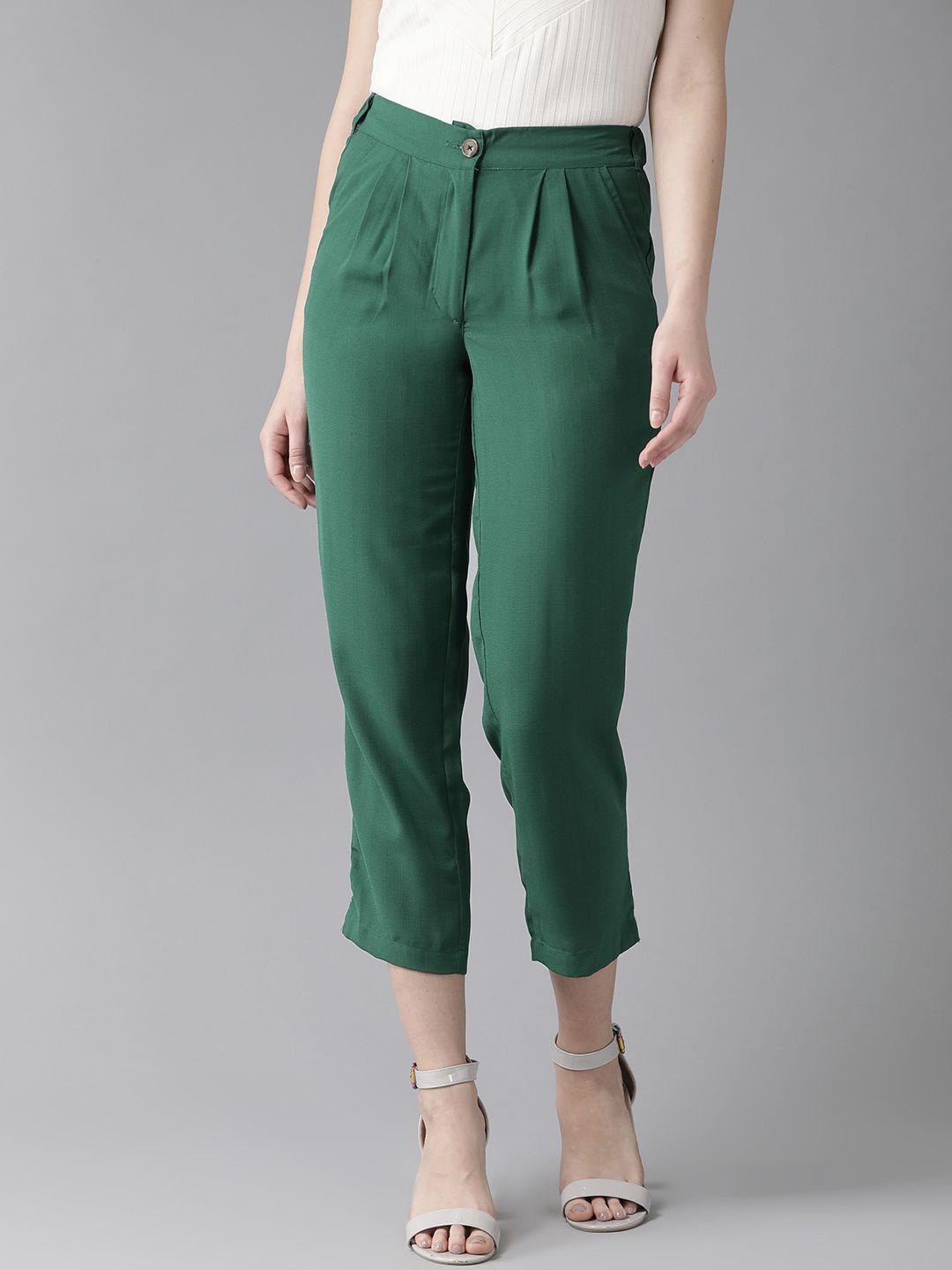hubberholme women green slim fit solid cropped regular trousers