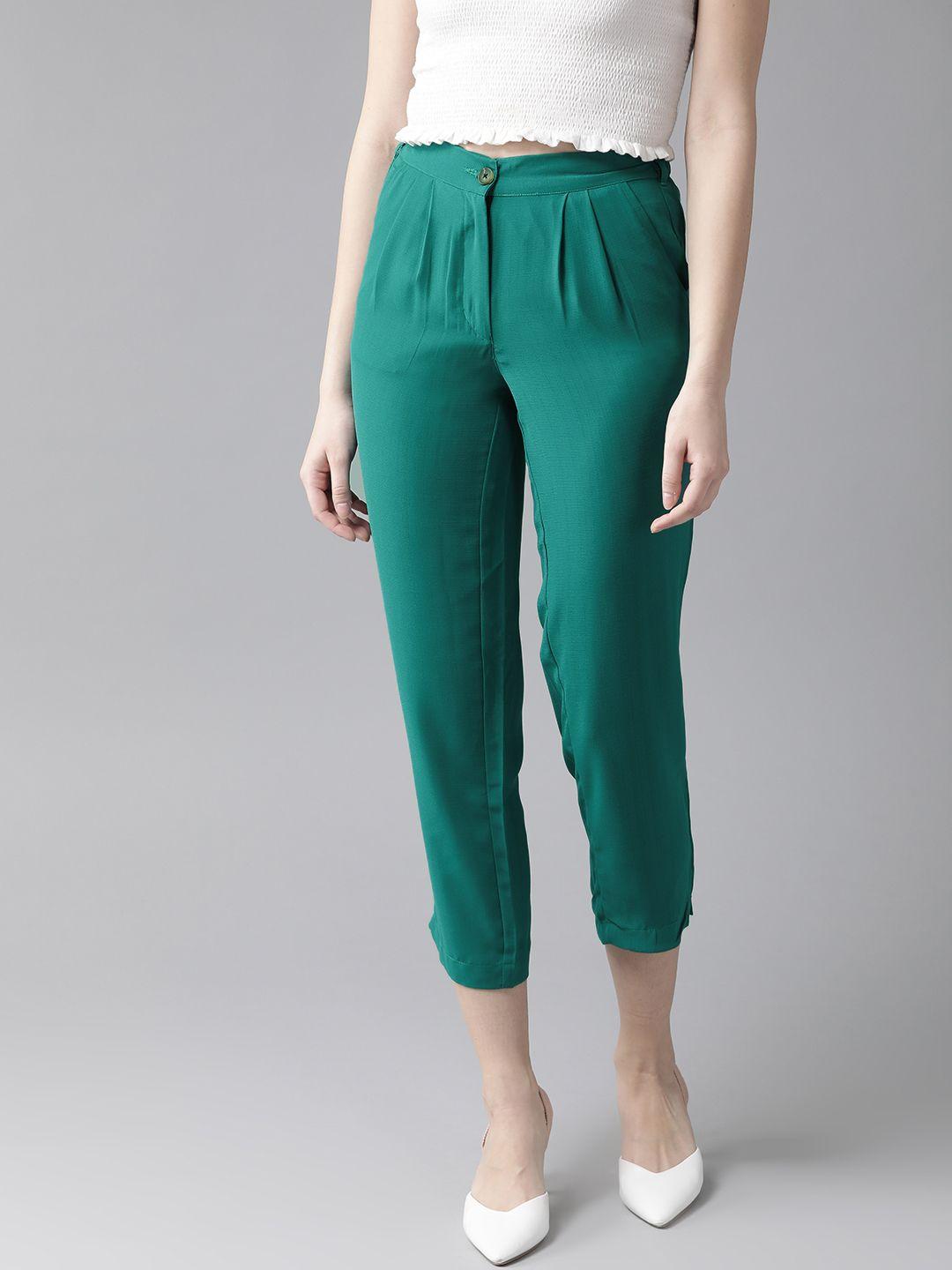 hubberholme women green slim fit solid cropped trousers