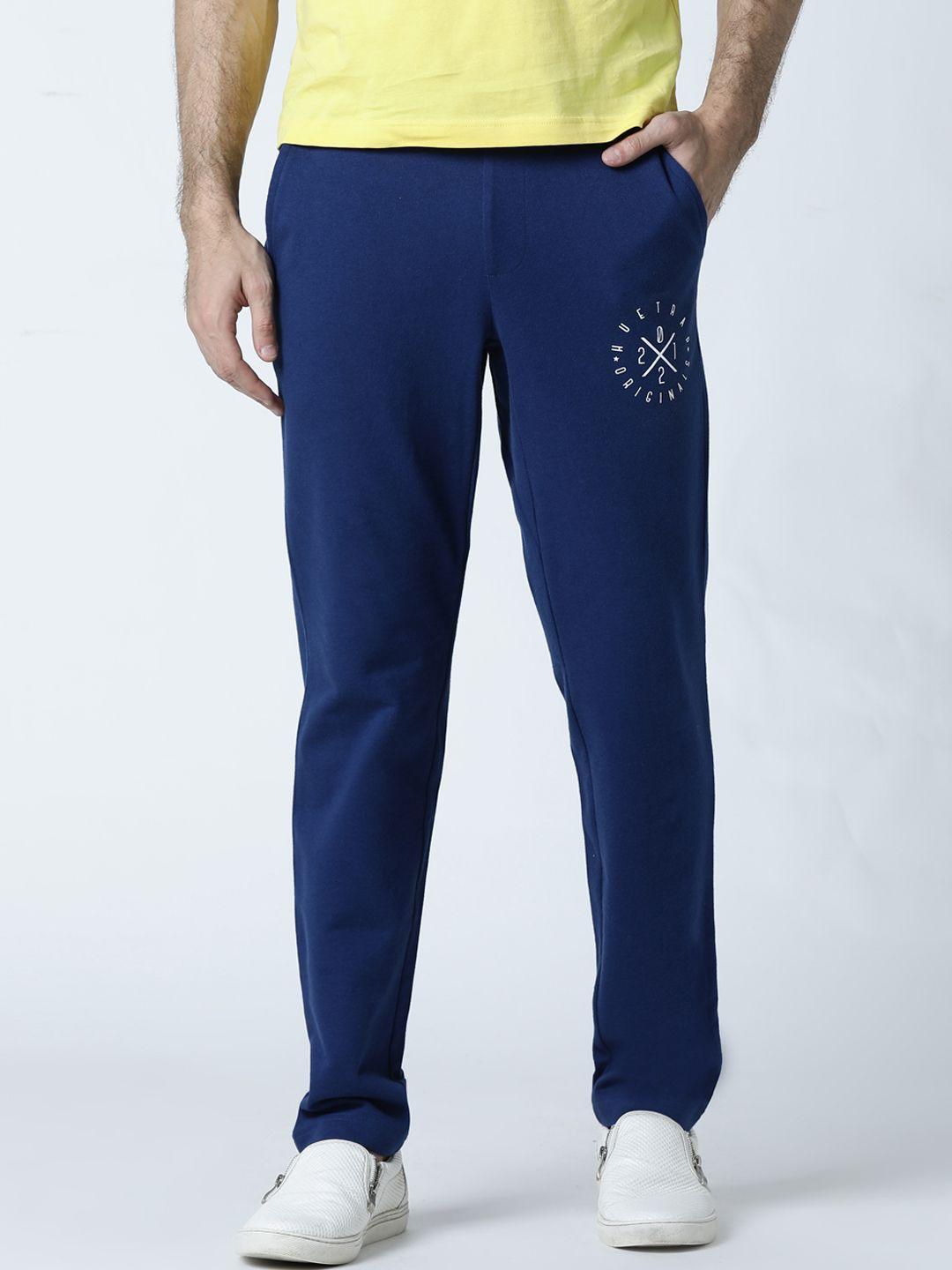 huetrap men blue solid straight fit track pants