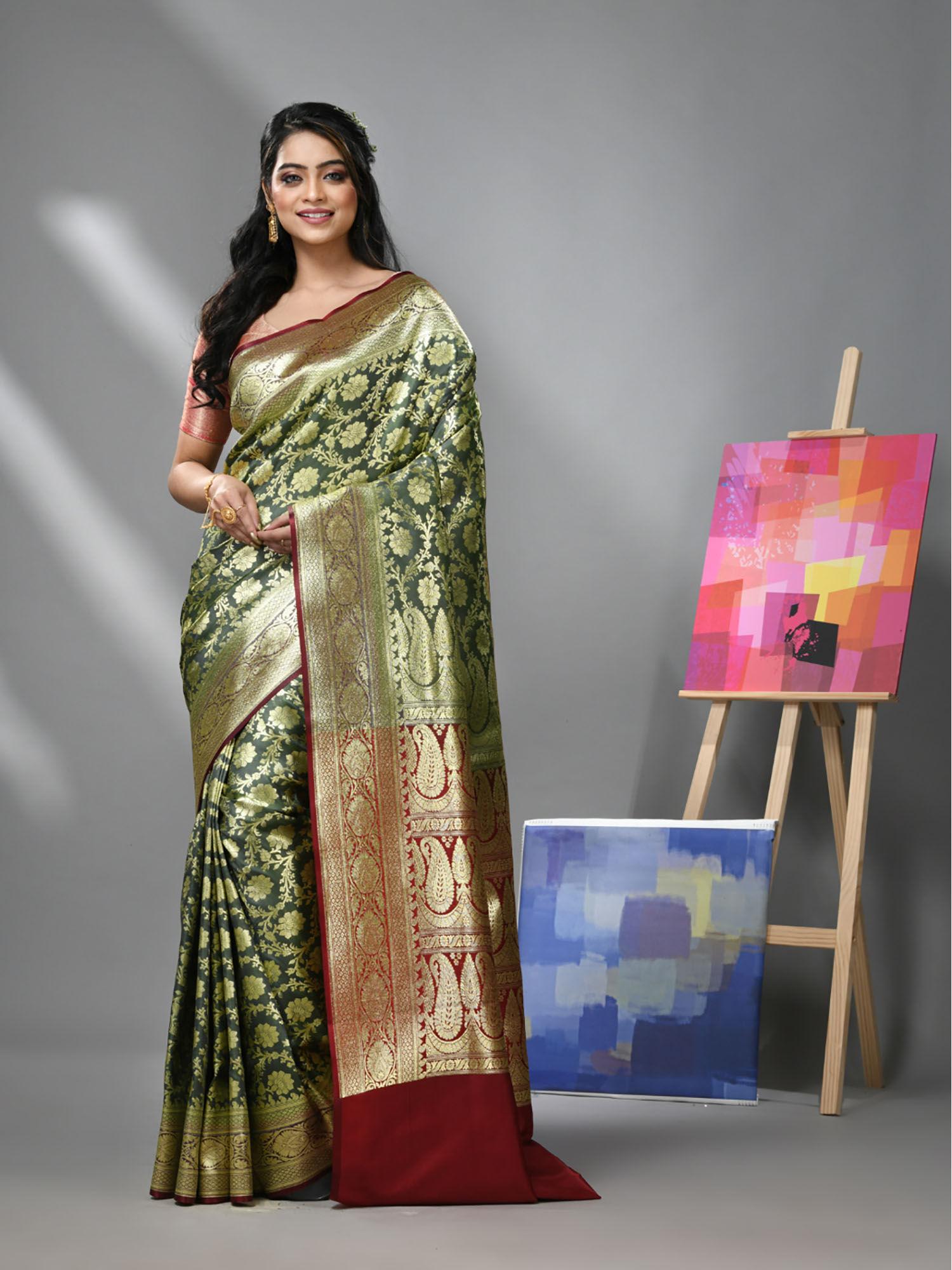 hunter green silk banarasi saree with zari woven designs & unstitched blouse