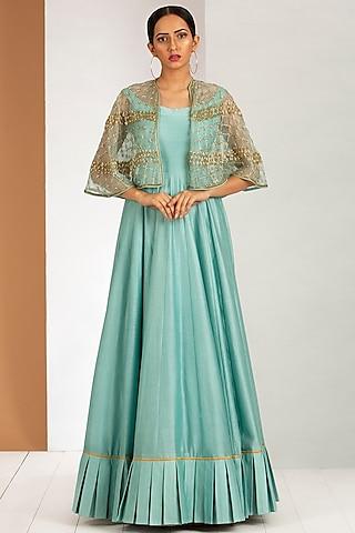 ice blue flared gown with cape