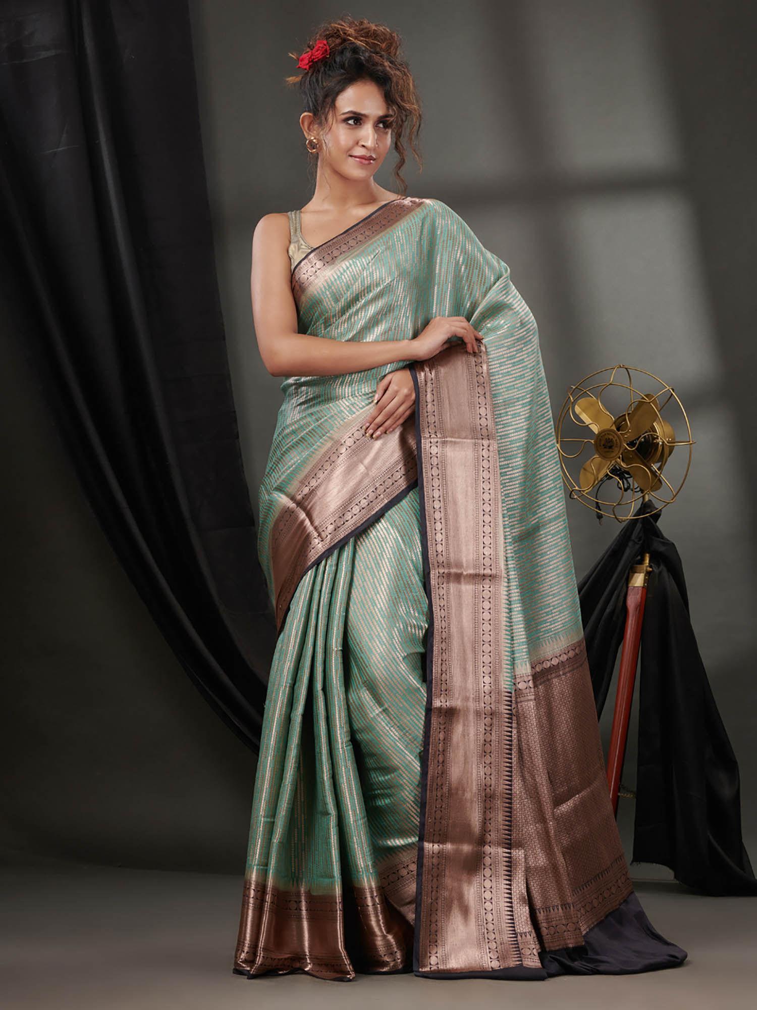 ice green blended silk handwoven saree with woven zari designs & unstitched blouse