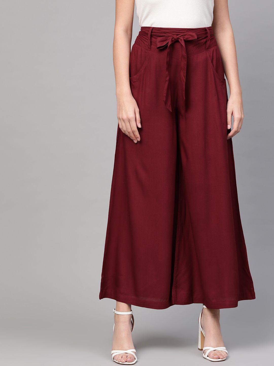 idalia women maroon solid flared palazzos