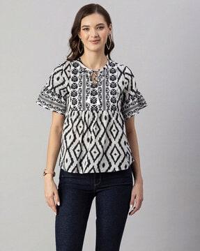 ikat printed tunic with bell-sleeves