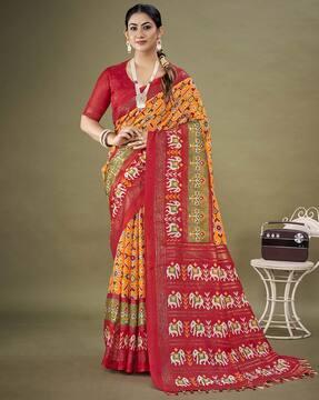 ikat print saree with floral print blouse piece