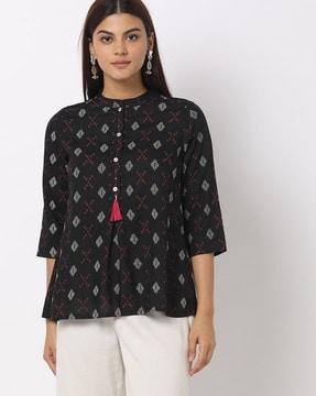 ikat top with tassel accent