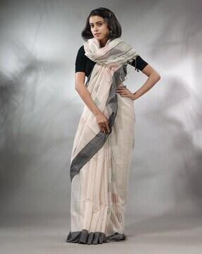 ikkat print saree with contrast pallu