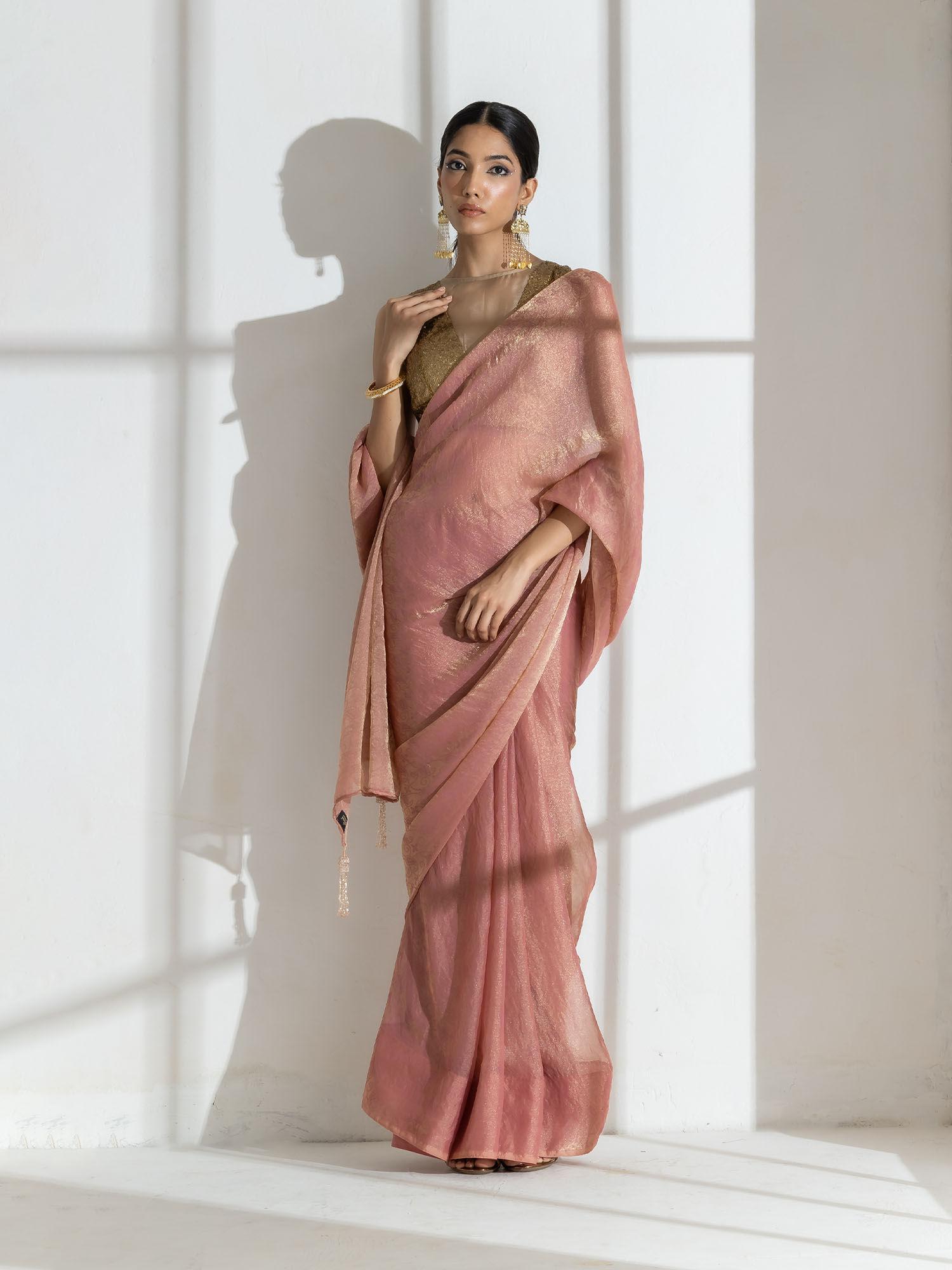 illusion pink paisley gold design chiffon saree with long beaded latkan