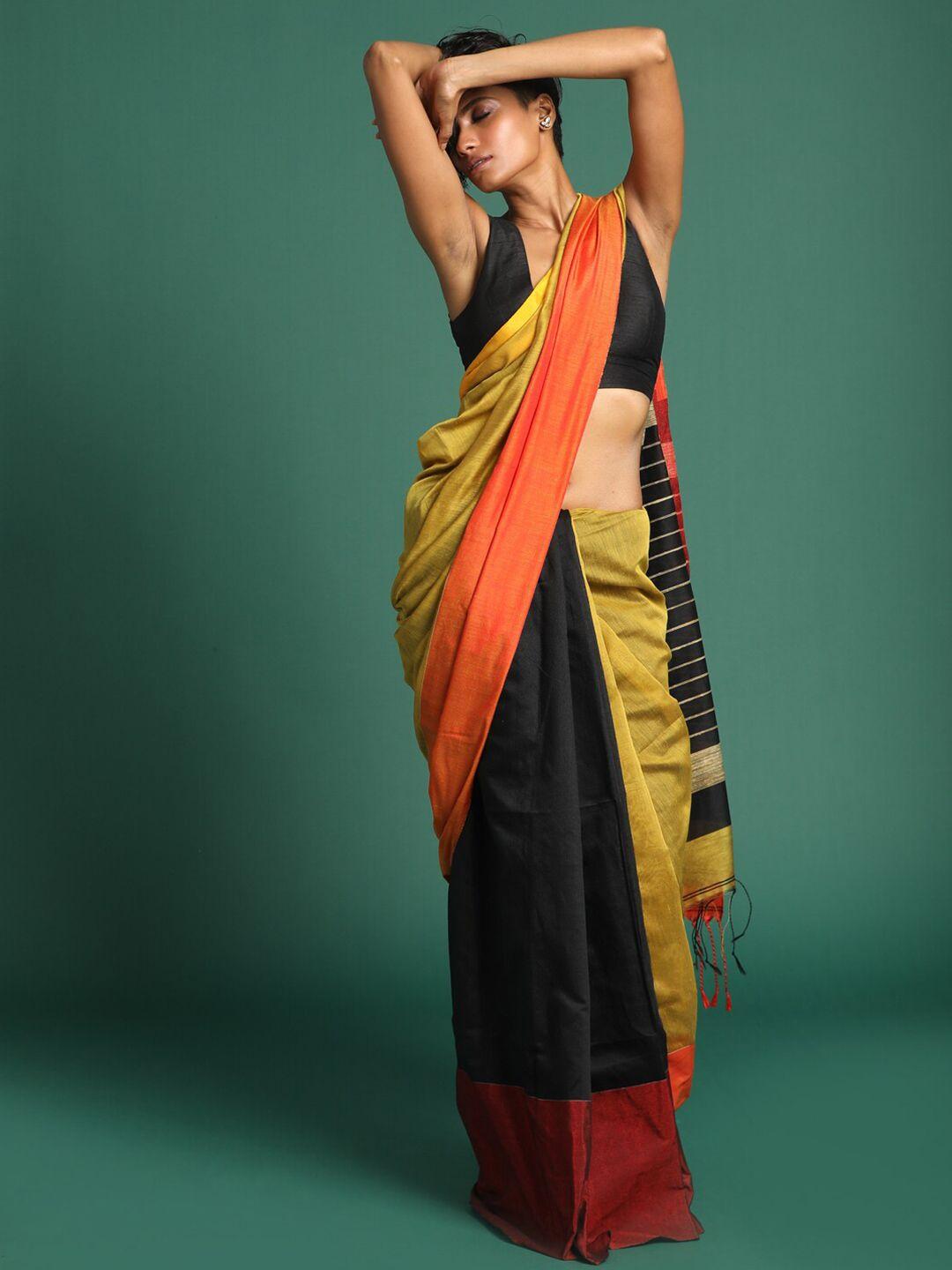 indethnic orange & black colourblocked half and half jamdani saree