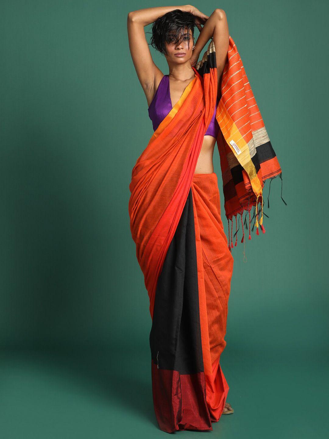 indethnic orange & black colourblocked zari half and half jamdani saree