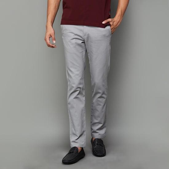 indian terrain men textured slim-fit casual trousers