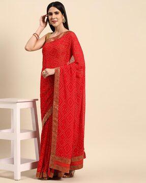 indian women red georgette foil with swarovski work solid saree