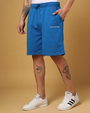 institutional hwk shorts with slip pockets
