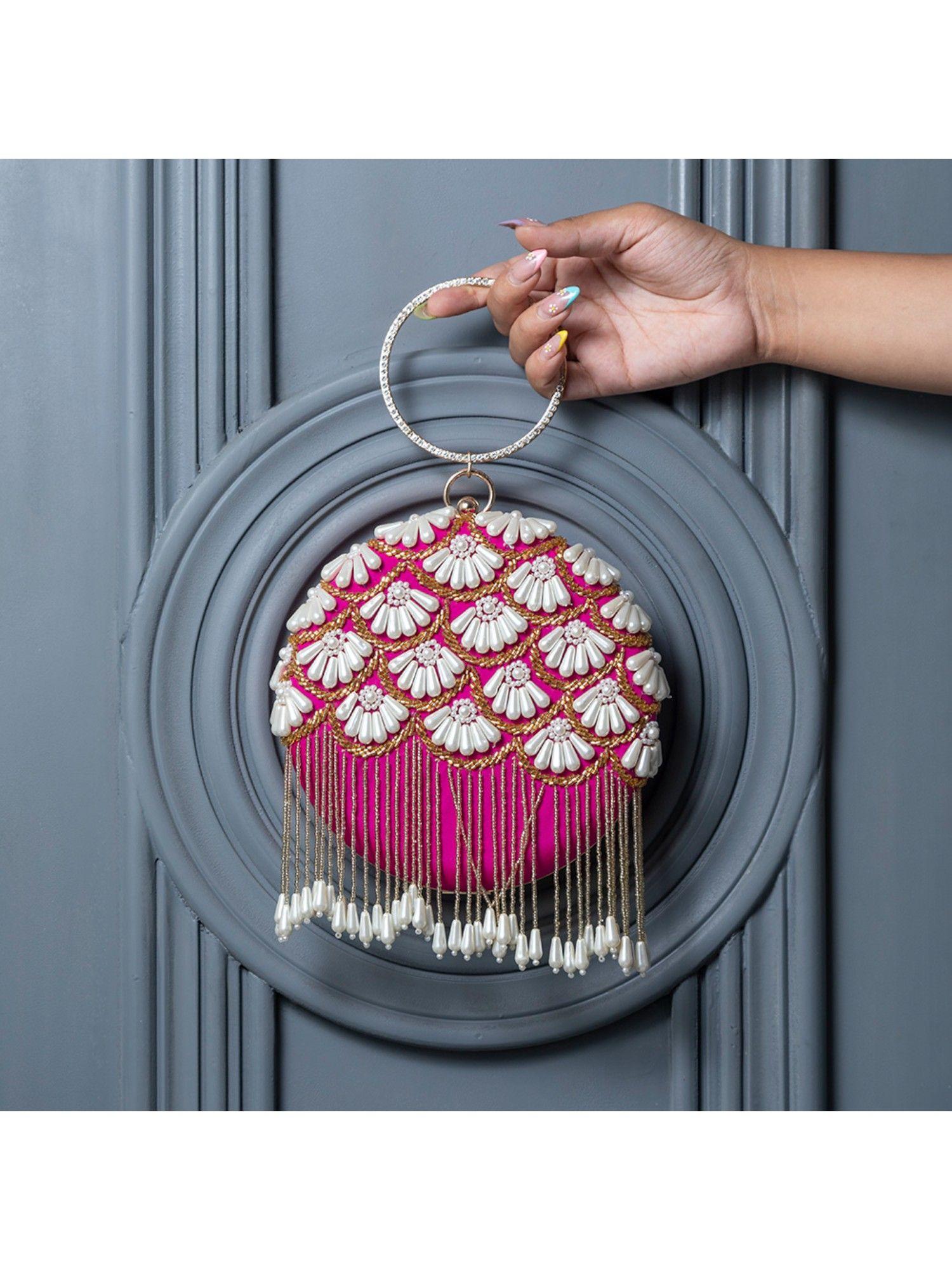 irsa hand embroidered clutch with tassles