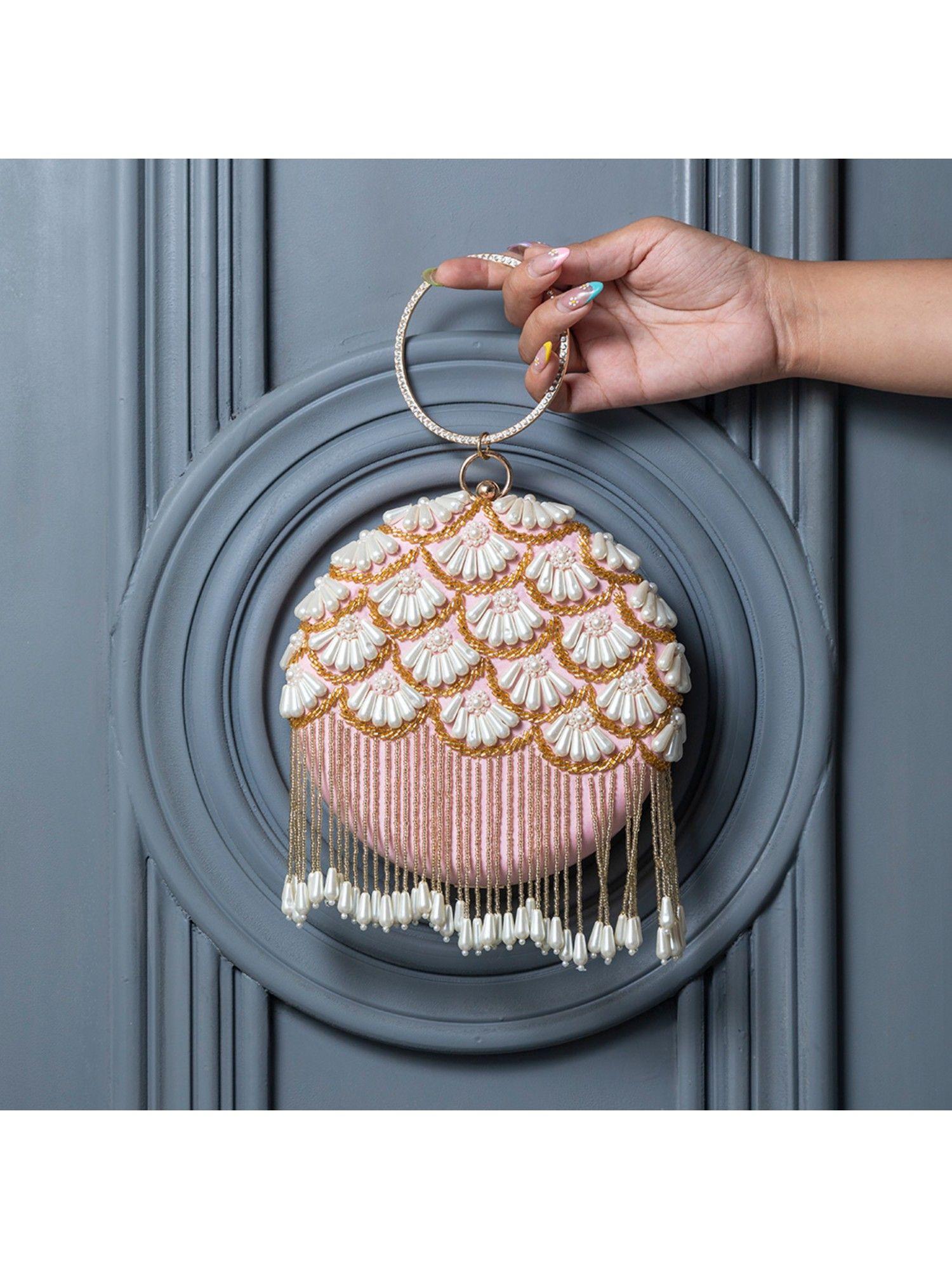 irsa hand embroidered clutch with tassles