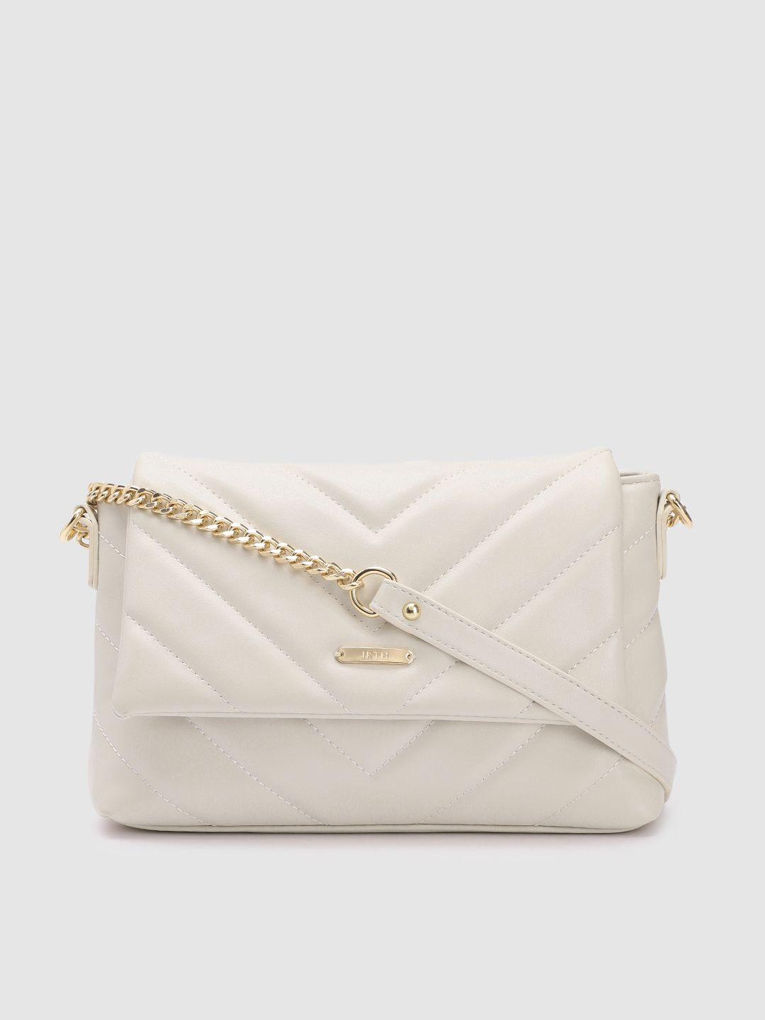 irth off white quilted sling bag