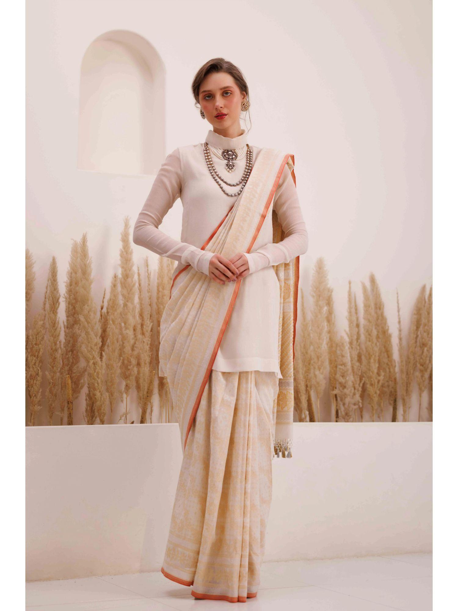 ivory aarvi saree with stitched blouse