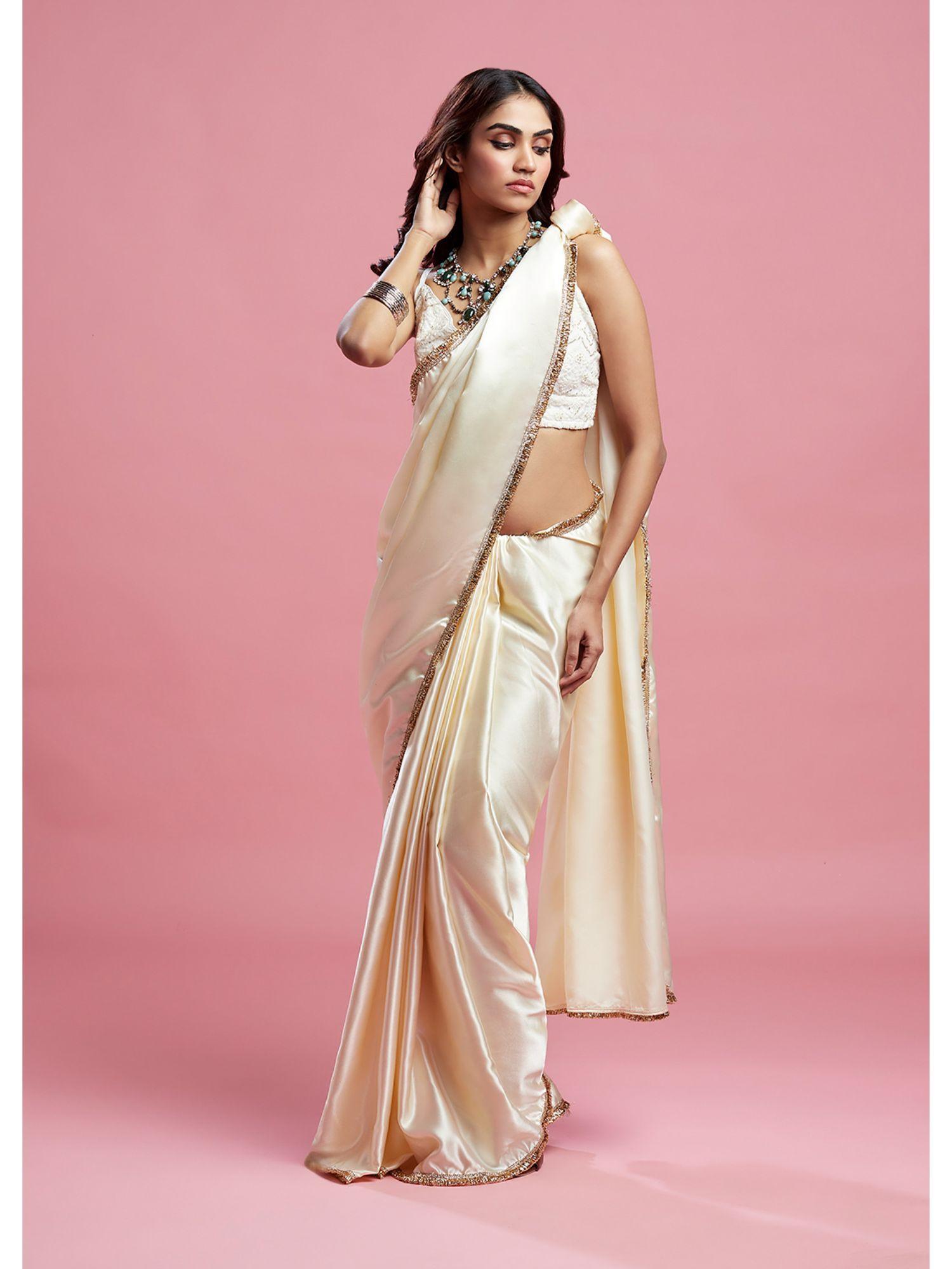 ivory cocktail saree with stitched blouse