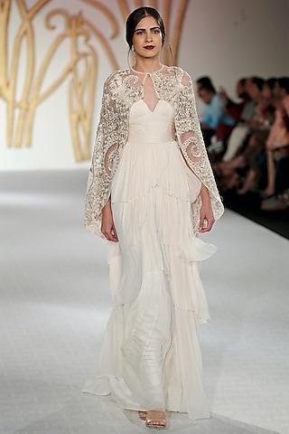 ivory ruffled gown with cape set