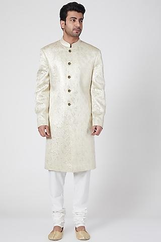 ivory sherwani with gold buttons