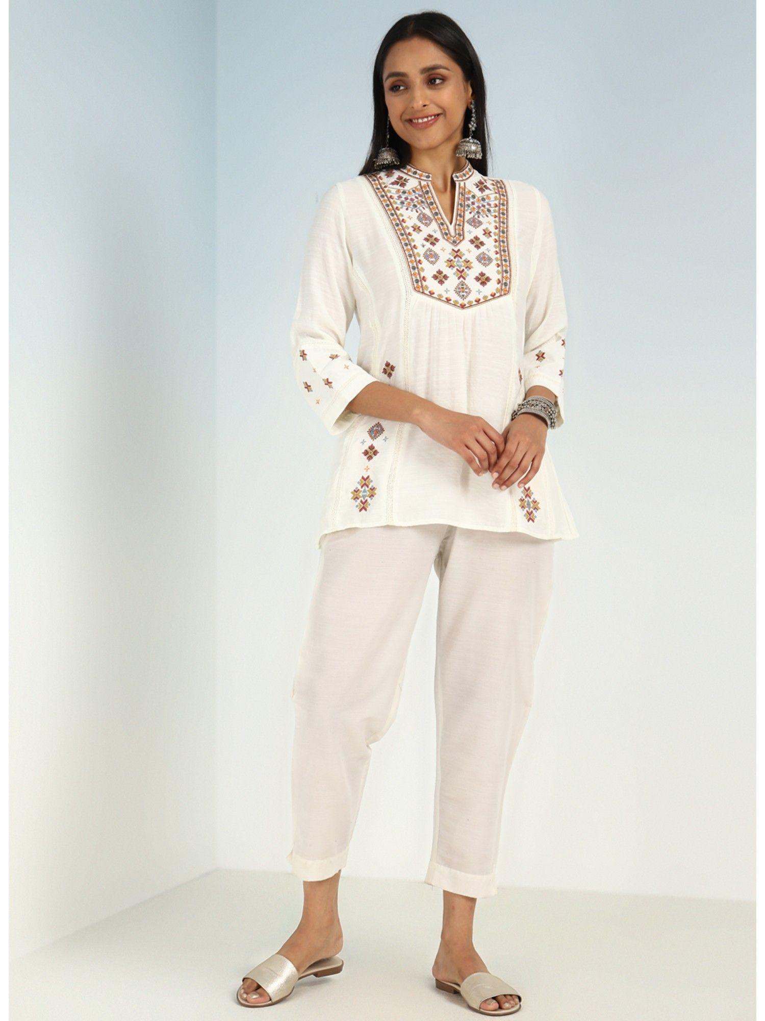 ivory tunic with front yoke embroidery detail