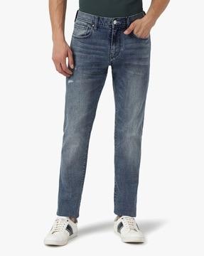 j13 slim fit mid-rise washed jeans