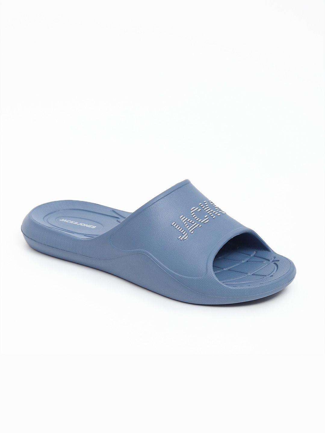 jack & jones men blue printed croslite sliders