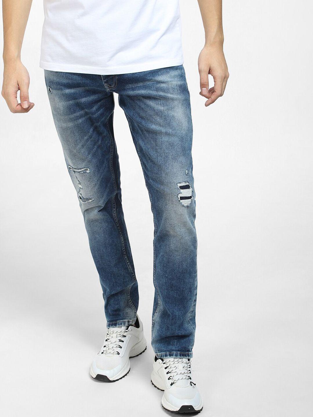 jack & jones men blue slim fit mildly distressed cotton jeans