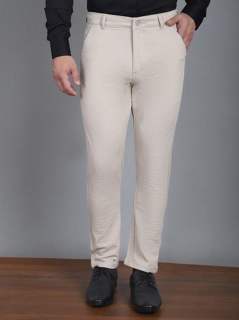 jainish cream tapered fit texture trousers