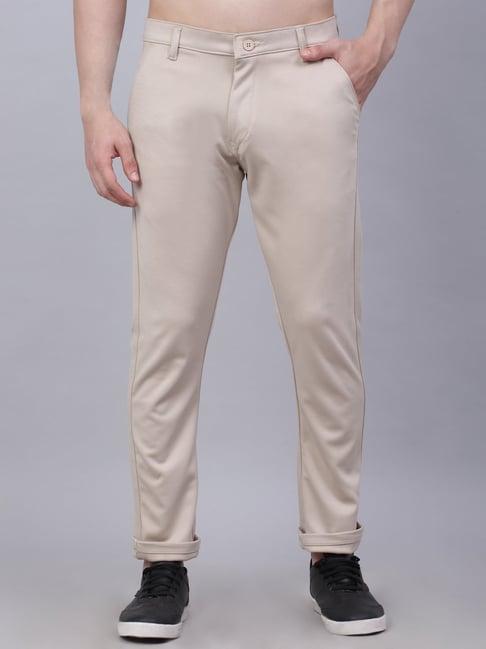 jainish cream tapered fit flat front trousers