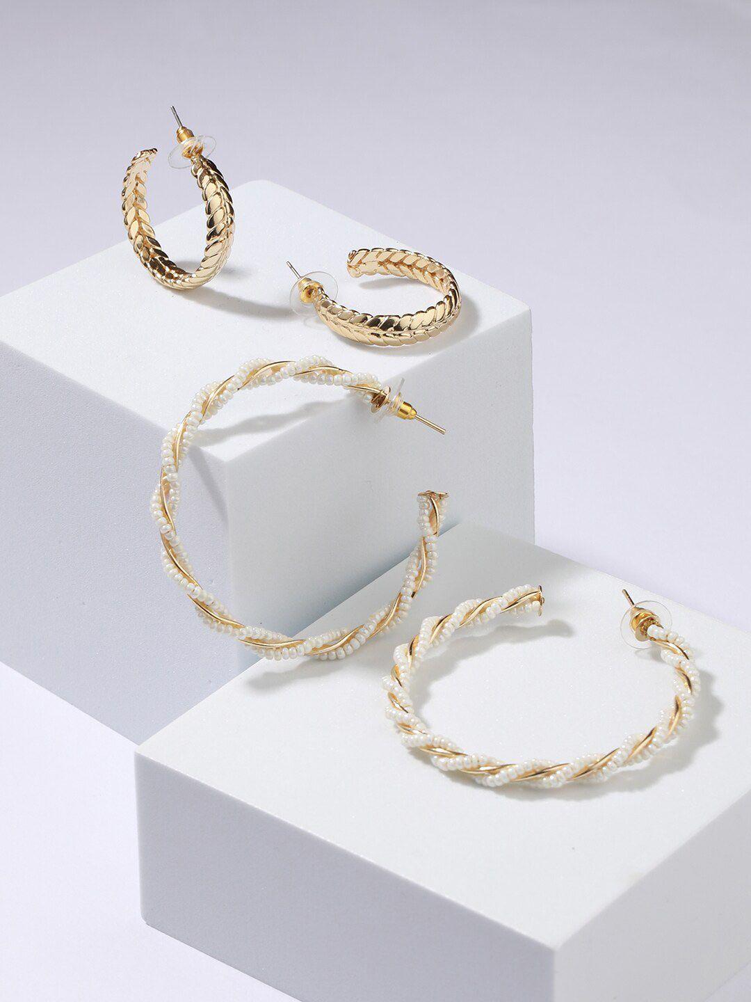 jazz and sizzle set of 2 gold plated circular hoop earrings