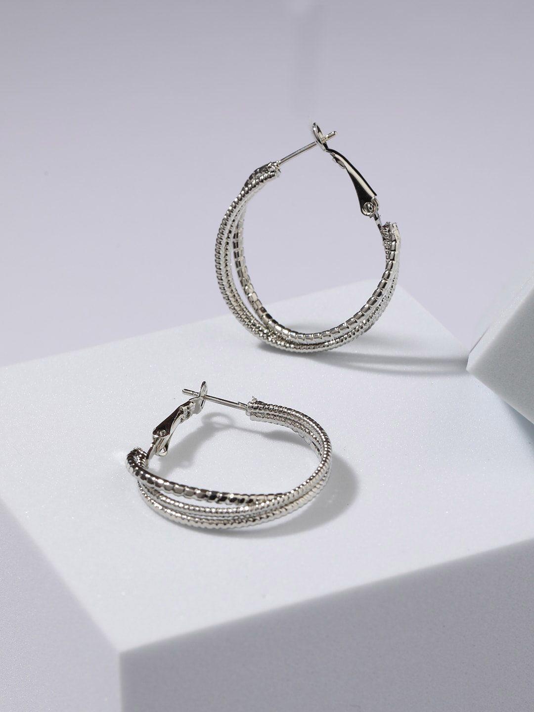 jazz and sizzle sliver plated textured  circular hoop earrings