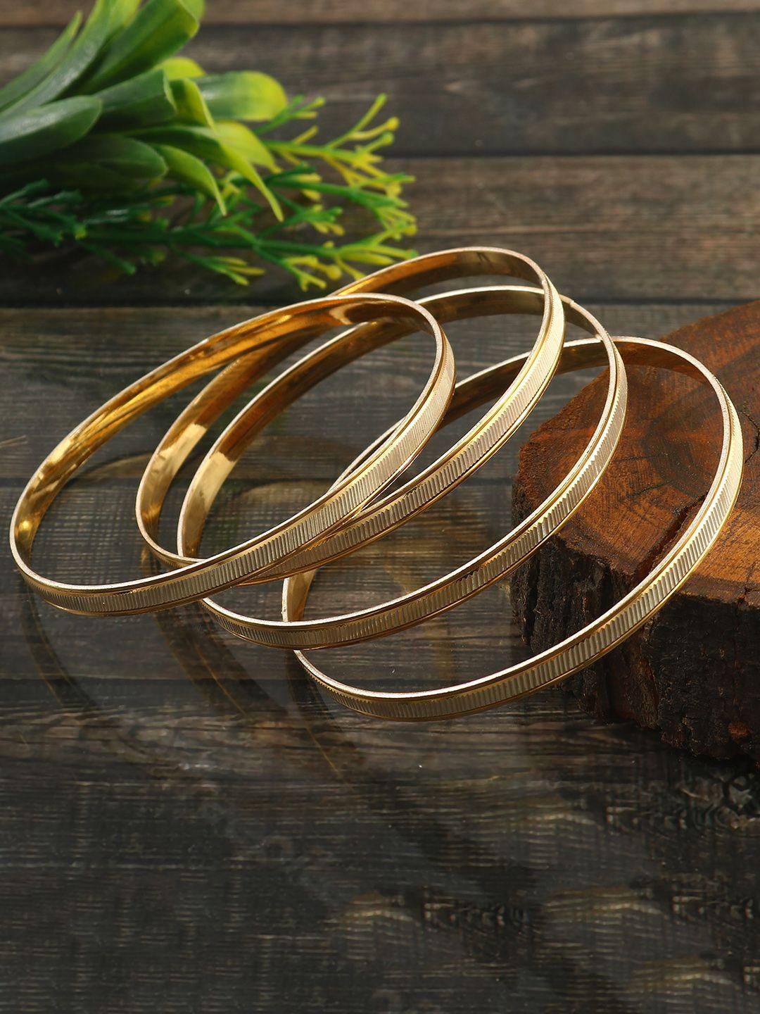 jewar mandi set of 4 gold-plated etching work bangles