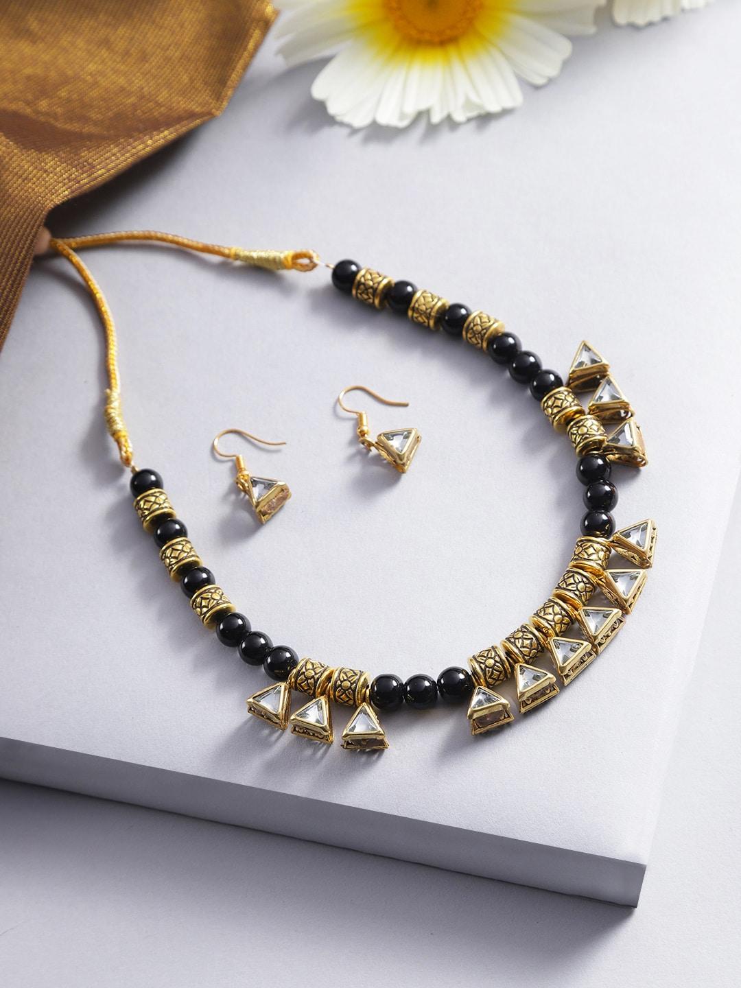 jewels galaxy black gold-plated stone-studded beaded jewellery set