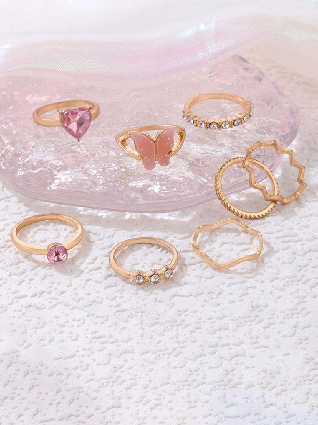 jewels galaxy set of 8 gold-plated stone studded finger ring