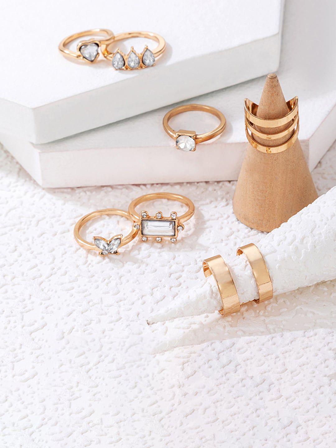 jewels galaxy set of 8 gold-plated stone-studded finger ring