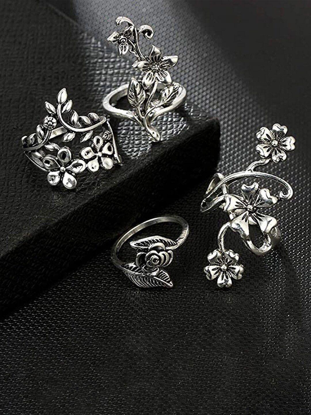 jewels galaxy women set of 4 silver-plated oxidised floral design finger rings