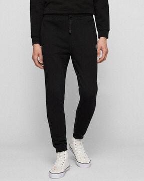 jogger pants with logo patch