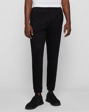 jogger pants with curved logo