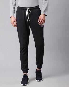 joggers with embroidered patch